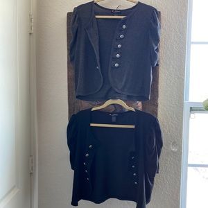 1 black and 1 grey vest. Silver buttons on both(they do not button close).